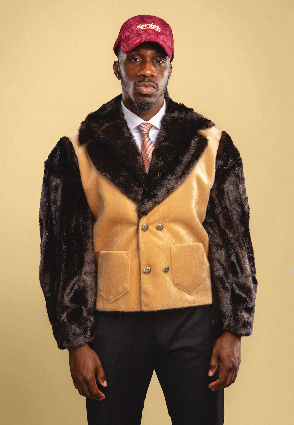 Named after the Swahili word for “lion,” the Simba Jacket embodies power, royalty, and resilience. With bold faux-fur textures reminiscent of a lion’s mane and the precision of sharp tailoring, the Simba channels king energy into everyday style.