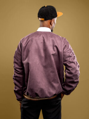 The Rococo Jacket is crafted for those who appreciate subtle artistry. Inspired by the grandeur of 18th-century Europe, its ruched sleeves recall the artistry and extravagance of the Rococo period. Created in vegan suede with a clean, modern silhouette, it transforms historical opulence into modern wearable art. 