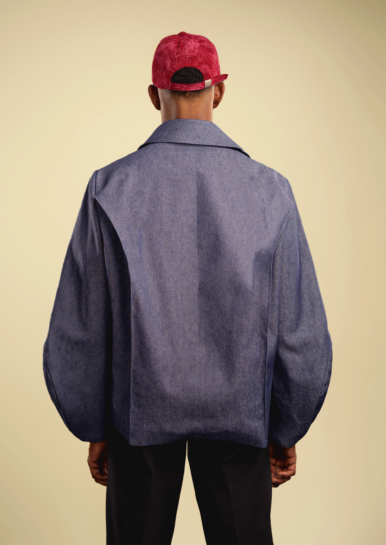 Mysterious. Commanding. Timeless. The Sphinx Jacket draws its name from the legendary guardian of secrets. Its lantern sleeves and sculpted back silhouette embody quiet power, while its denim construction grounds it in modern wearability.