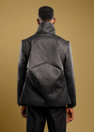 The Spaceman Jacket looks to the future while standing firmly in the present. Inspired by the geometry of sci-fi armor and engineered with Tesslo’s craftsmanship, it redefines outerwear with its sculpted back, commanding collar, and luminous contrast zip. Designed to protect from the cold.