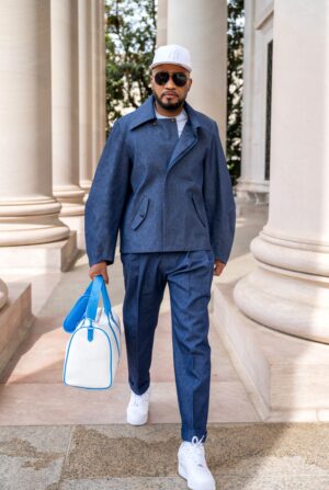 The Tessletic Indigo Set reimagines modern menswear through the lens of luxury sport and elevated tailoring. Centered around the signature Sphinx Jacket from the Tesslo Just Jackets collection, the look pairs sculptural outerwear with pleated indigo denim trousers for a refined yet effortless statement.