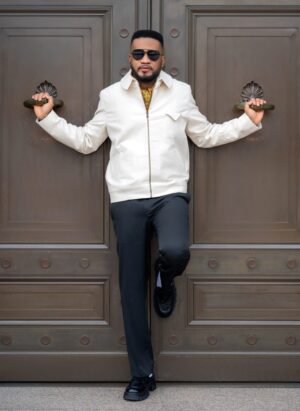 The TESSLETIC Harrington I Jacket brings understated luxury to a timeless menswear silhouette. Crafted from full cotton denim in a soft cream tone, the jacket balances refined tailoring with relaxed athletic ease. It’s designed for the modern professional whose style is quiet but unmistakably intentional. The fabric carries an organic texture that adds personality and distinction to the garment.