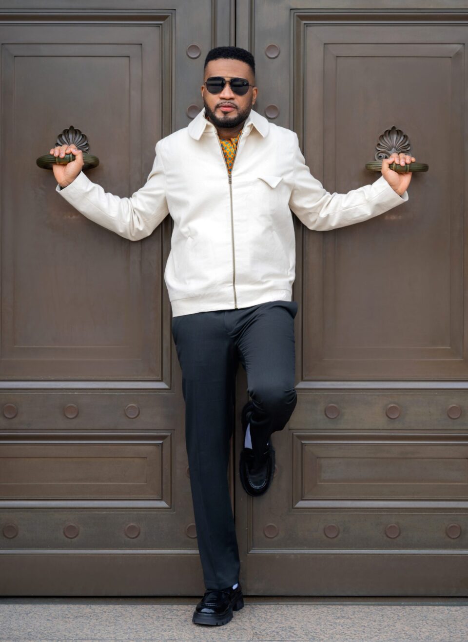 The TESSLETIC Harrington I Jacket brings understated luxury to a timeless menswear silhouette. Crafted from full cotton denim in a soft cream tone, the jacket balances refined tailoring with relaxed athletic ease. It’s designed for the modern professional whose style is quiet but unmistakably intentional. The fabric carries an organic texture that adds personality and distinction to the garment.
