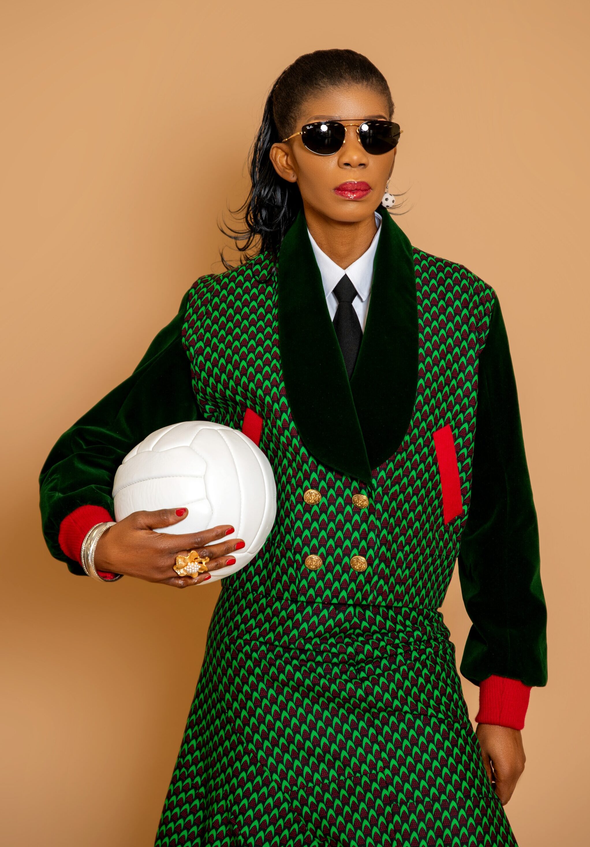 Derived from the signature Tesslo Atlético Jacket, Atlético Set I reimagines the spirit of athletic achievement through a double-breasted silhouette and an uneven paneled skirt designed for movement. A statement look for women who understand the power of presence.