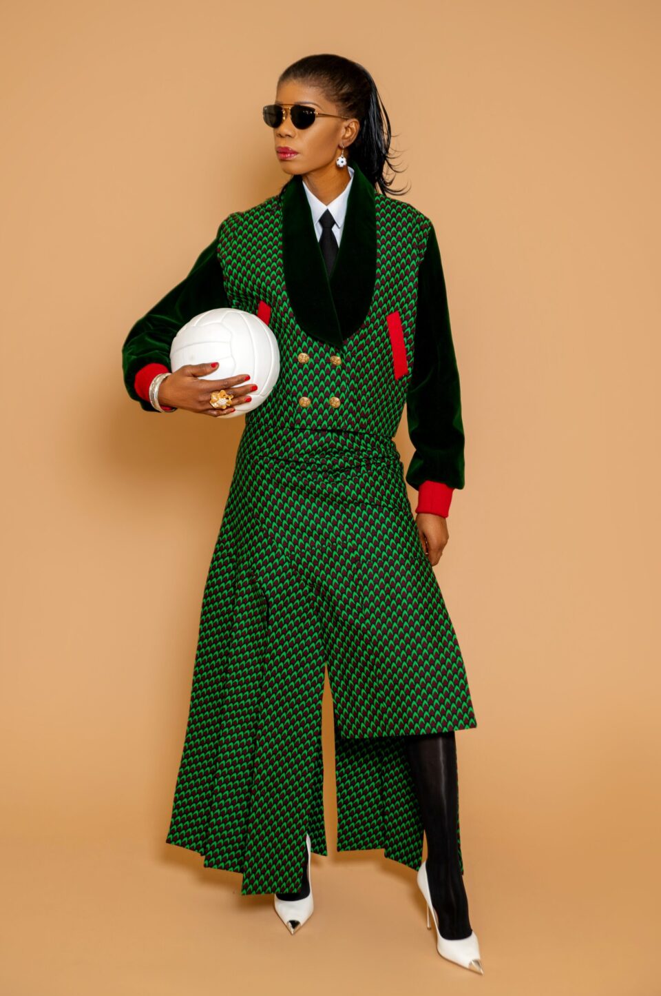 Derived from the signature Tesslo Atlético Jacket, Atlético Set I reimagines the spirit of athletic achievement through a double-breasted silhouette and an uneven paneled skirt designed for movement. A statement look for women who understand the power of presence.